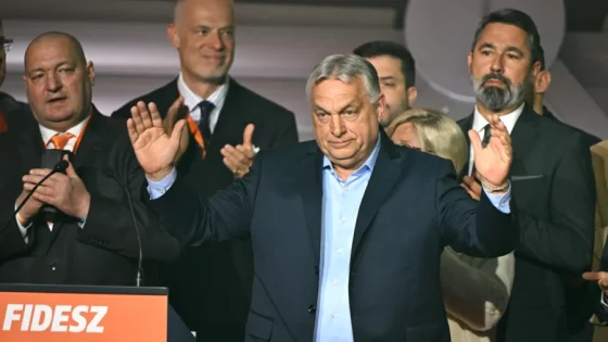 Hungary's Prime Minister Viktor Orban salutes to supporters at the Balna center in Budapest during a general election in Hungary on April 12, 2026. (Attila Kisbenedek/AFP via Getty Images) — Image credit: NTD News