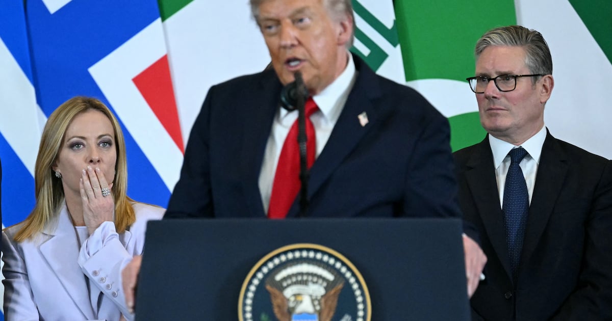 US President Donald Trump (C) speaks as Italian Prime Minister Giorgia Meloni (L) and Britain's Prime Minister Keir Starmer watch during the Sharm El-Sheikh Peace Summit in the Egyptian Red Sea resort town of Sharm el-Sheikh on October 13, 2025. Trump on October 13 hailed a Gaza summit in Egypt as a "tremendous day" for the Middle East, saying a document would be signed on "rules and regulations" for future talks. (Photo by SAUL LOEB / AFP) (Photo by SAUL LOEB/AFP via Getty Images) — Image credit: U.S. Ally Refuses to Let Trump's Warplanes Land as Conflict Spirals